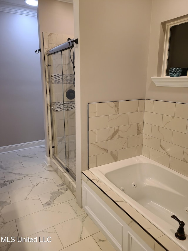 4024 Honshu St, Bay Saint Louis, MS 39520 - full bath featuring a stall shower, a jetted tub, marble finish floor, and baseboards