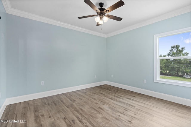 unfurnished room featuring ceiling fan, light hardwood / wood-style floors, and crown molding