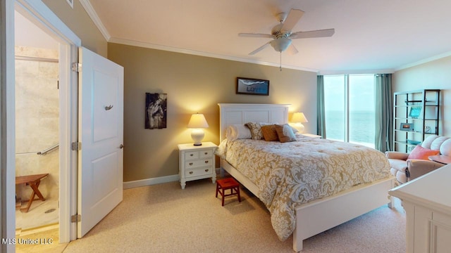 bedroom featuring crown molding, ceiling fan, and a water view