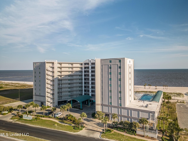 view of building exterior with a water view