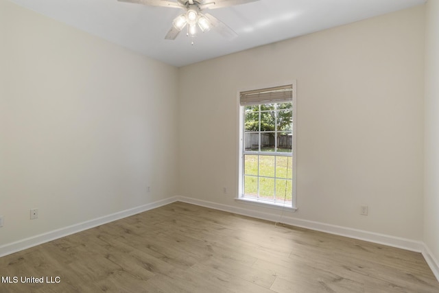 119 Middle Field Dr, Canton, MS 39046 - unfurnished room with baseboards, light wood-type flooring, and ceiling fan