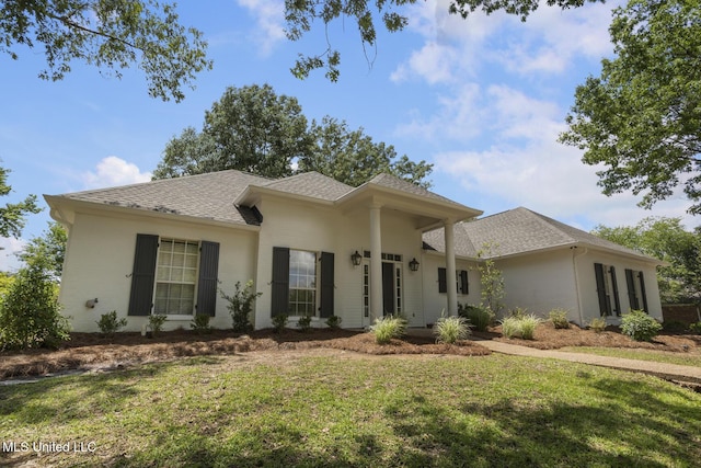 119 Middle Field Dr, Canton, MS 39046 - view of front of house with a front yard, a shingled roof, and brick siding