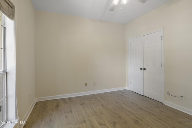 119 Middle Field Dr, Canton, MS 39046 - empty room featuring a ceiling fan, wood finished floors, and baseboards