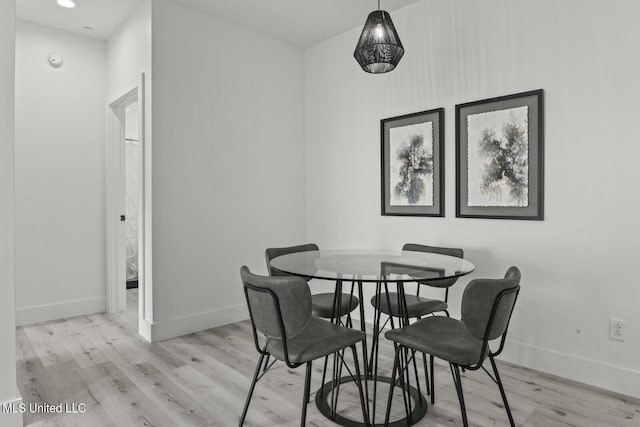 1302 Magnolia St Unit 109, Gulfport, MS 39501 - dining room with baseboards, recessed lighting, and wood finished floors