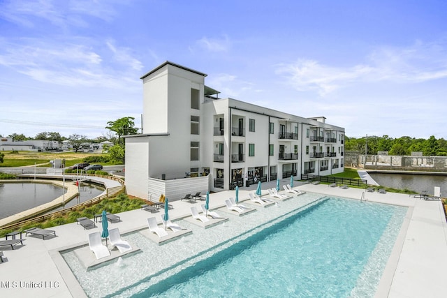 1302 Magnolia St Unit 109, Gulfport, MS 39501 - community pool featuring a patio area and fence