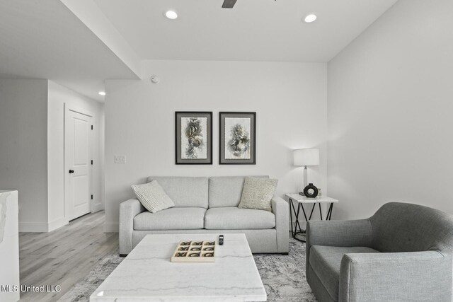 1302 Magnolia St Unit 109, Gulfport, MS 39501 - living room with light wood-style floors, baseboards, and recessed lighting