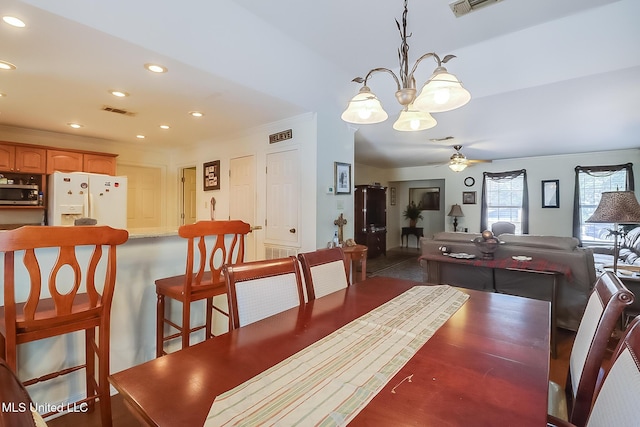 dining area featuring crown molding and ceiling fan