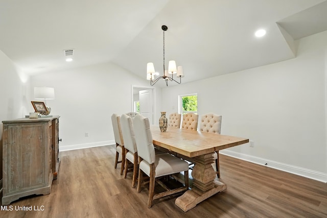 280 Bobby Ln, Picayune, MS 39466 - dining room featuring wood finished floors, vaulted ceiling, baseboards, a chandelier, and recessed lighting