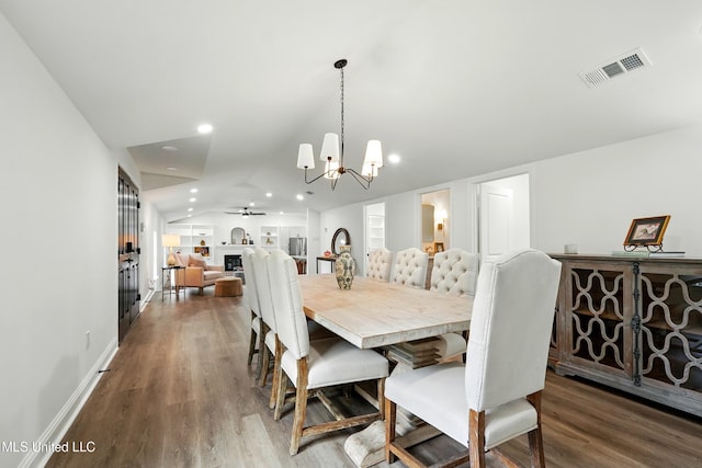 280 Bobby Ln, Picayune, MS 39466 - dining space with vaulted ceiling, wood finished floors, a chandelier, ceiling fan, and recessed lighting