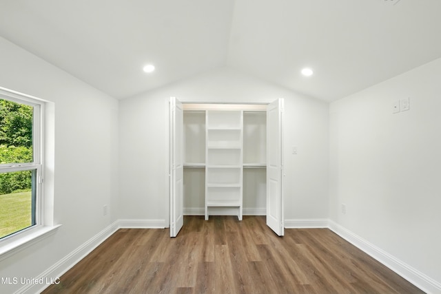 280 Bobby Ln, Picayune, MS 39466 - unfurnished bedroom with wood finished floors, lofted ceiling, baseboards, recessed lighting, and a closet