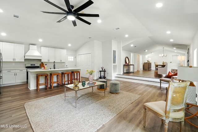 280 Bobby Ln, Picayune, MS 39466 - living room featuring lofted ceiling, a ceiling fan, wood finished floors, and recessed lighting