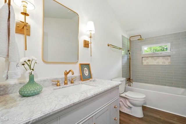 280 Bobby Ln, Picayune, MS 39466 - bathroom featuring wood finished floors, vanity, toilet, and tub / shower combination