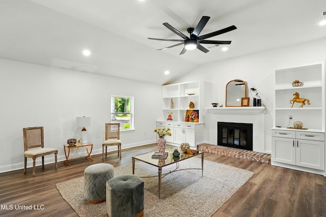 280 Bobby Ln, Picayune, MS 39466 - living room with dark wood-style flooring, a brick fireplace, vaulted ceiling, a ceiling fan, and recessed lighting