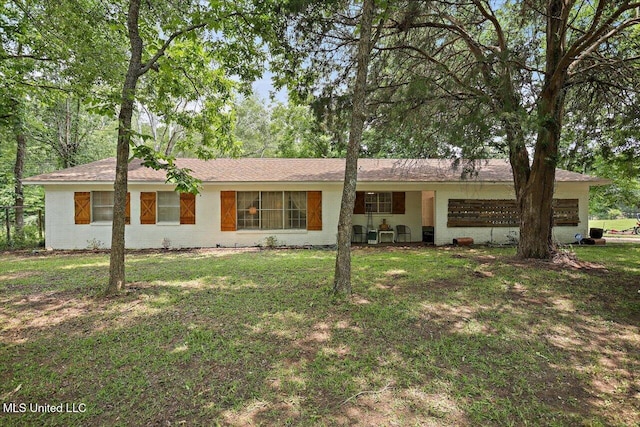 1563 Dry Creek Rd, Magee, MS 39111 - single story home with a front lawn and brick siding