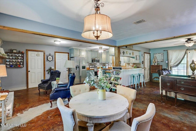 1563 Dry Creek Rd, Magee, MS 39111 - dining area featuring concrete flooring, a ceiling fan, and baseboards