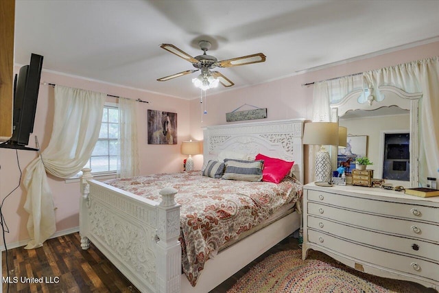 1563 Dry Creek Rd, Magee, MS 39111 - bedroom with dark wood-style floors, baseboards, ornamental molding, and a ceiling fan