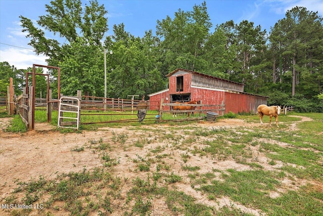 1563 Dry Creek Rd, Magee, MS 39111 - view of yard with a barn, an outdoor structure, and a gate