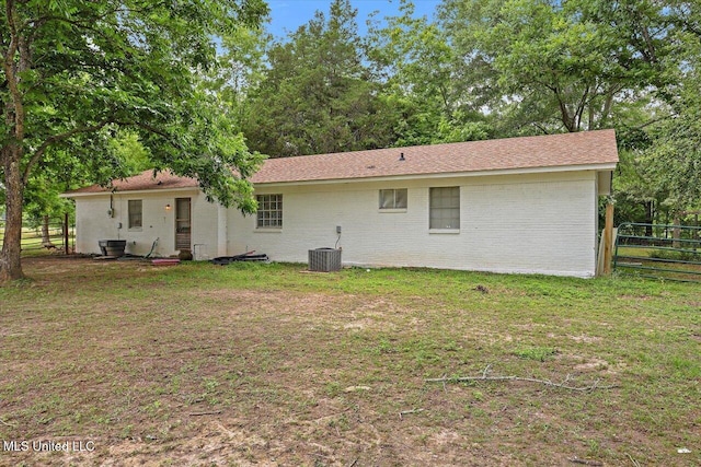 1563 Dry Creek Rd, Magee, MS 39111 - back of house with brick siding and cooling unit