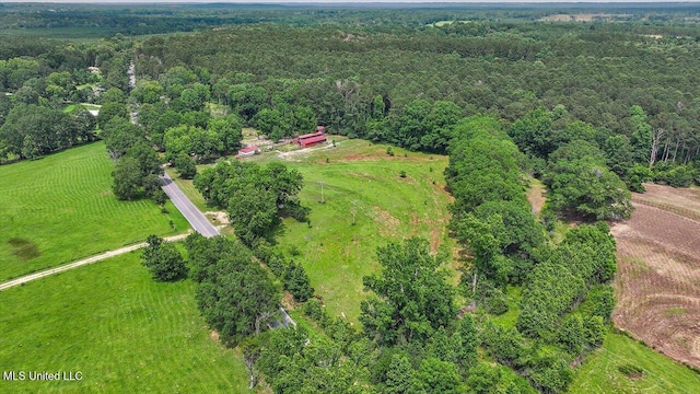 1563 Dry Creek Rd, Magee, MS 39111 - view of rural area featuring a heavily wooded area