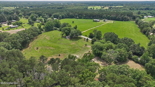 1563 Dry Creek Rd, Magee, MS 39111 - aerial overview of property's location with rural landscape and a heavily wooded area