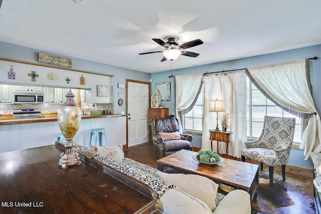 1563 Dry Creek Rd, Magee, MS 39111 - living room featuring ceiling fan