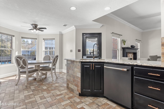 kitchen with dishwasher, sink, crown molding, ceiling fan, and a textured ceiling