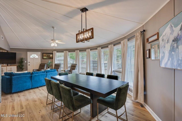 363 Lake Harbor Rd, Brandon, MS 39047 - dining room with plenty of natural light, light wood-type flooring, ceiling fan, baseboards, and vaulted ceiling