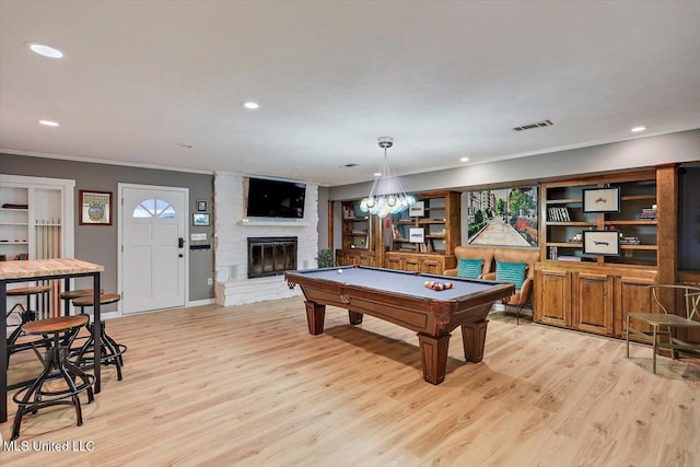 363 Lake Harbor Rd, Brandon, MS 39047 - playroom featuring ornamental molding, light wood-style floors, billiards, a large fireplace, and recessed lighting