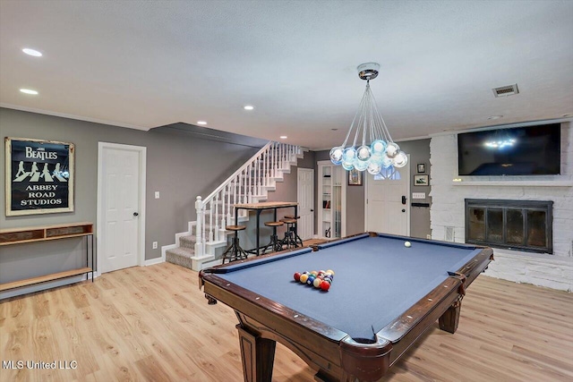 363 Lake Harbor Rd, Brandon, MS 39047 - game room with wood finished floors, billiards table, a brick fireplace, recessed lighting, and baseboards