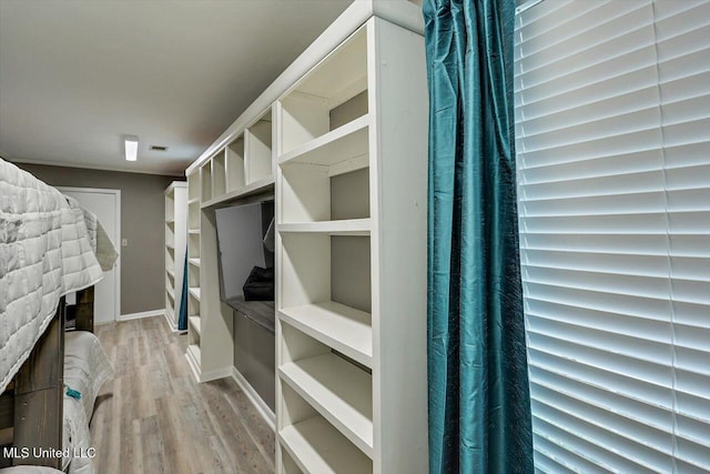 363 Lake Harbor Rd, Brandon, MS 39047 - spacious closet featuring wood finished floors