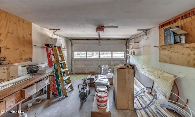 363 Lake Harbor Rd, Brandon, MS 39047 - garage featuring a garage door opener