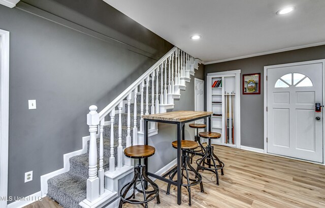 363 Lake Harbor Rd, Brandon, MS 39047 - entrance foyer featuring stairs, wood finished floors, baseboards, recessed lighting, and ornamental molding