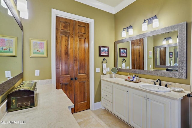 bathroom with vanity and tile patterned floors