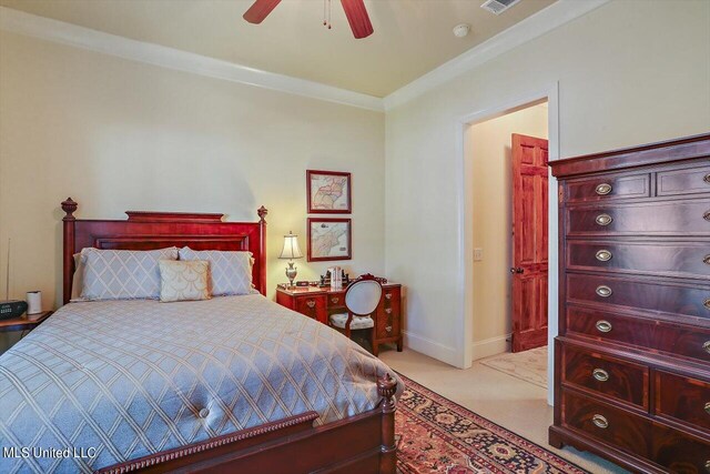 carpeted bedroom with crown molding and ceiling fan