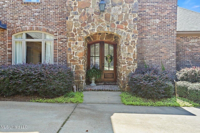 entrance to property featuring french doors