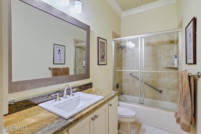 full bathroom with vanity, toilet, tile patterned floors, and combined bath / shower with glass door