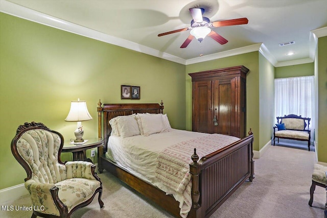 bedroom with light carpet, ornamental molding, and ceiling fan