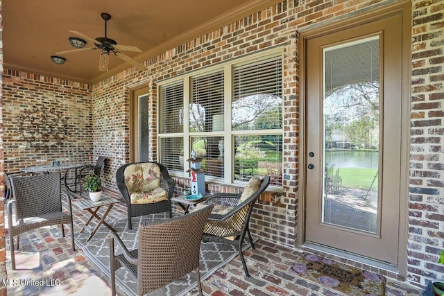 view of patio / terrace featuring ceiling fan