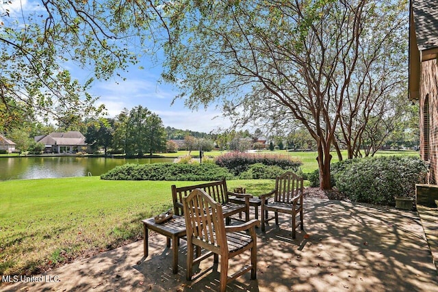 view of patio featuring a water view