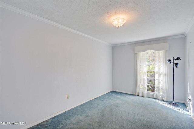 spare room with a textured ceiling, carpet floors, and ornamental molding