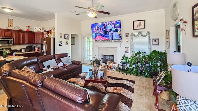 608 Carson Dr, Byram, MS 39272 - living room with a ceiling fan, crown molding, and a tile fireplace