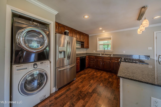 2623 Demaret Dr, Gulfport, MS 39507 - kitchen with stainless steel fridge with ice dispenser, stacked washer / drying machine, a sink, ornamental molding, and dark wood-style floors