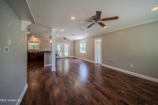 2623 Demaret Dr, Gulfport, MS 39507 - unfurnished living room with ceiling fan, ornamental molding, baseboards, dark wood-style floors, and recessed lighting