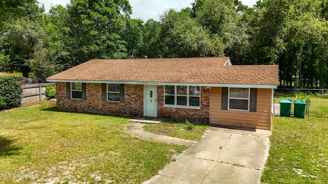 2623 Demaret Dr, Gulfport, MS 39507 - bungalow-style home featuring roof with shingles, driveway, and brick siding