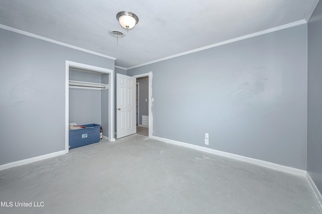 unfurnished bedroom with a closet, concrete floors, and crown molding