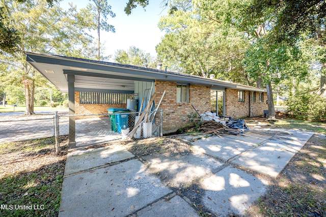 view of front facade with a carport