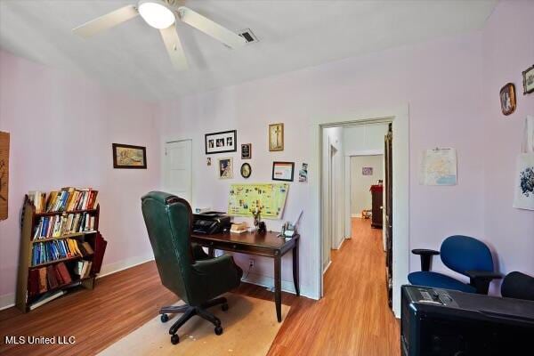 office featuring ceiling fan and light hardwood / wood-style flooring