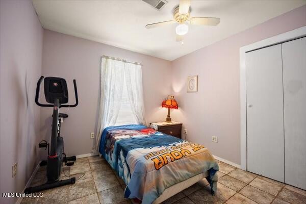 bedroom with a closet and ceiling fan