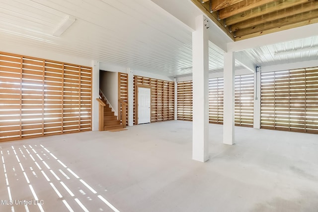 interior space featuring stairs and concrete floors