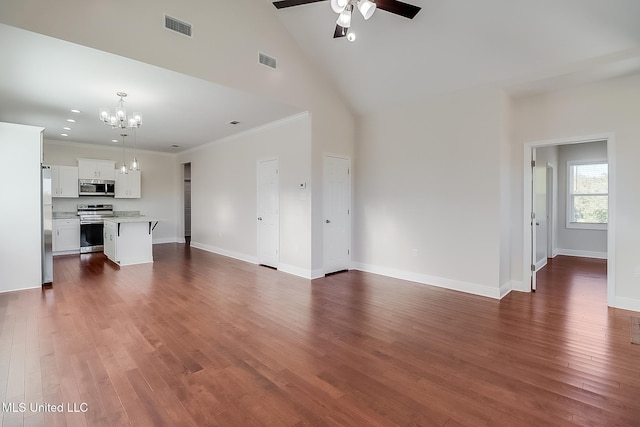 unfurnished living room featuring dark wood finished floors, visible vents, and baseboards